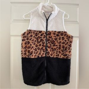 Sleeveless zip up vest